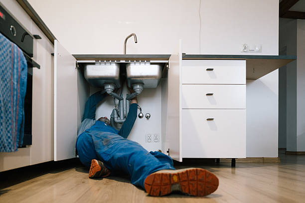 Professional Drain Cleaning technician working in Springville, IN
